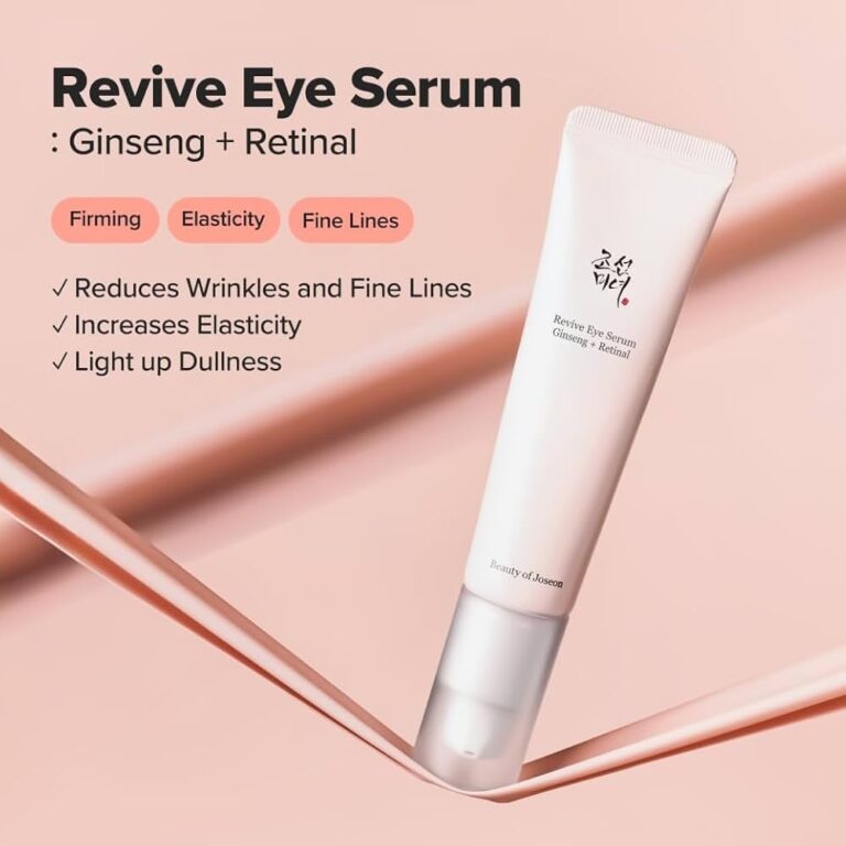 En tube Beauty Of Joseon - Revive Eye Serum : Ginseng + Retinal vises på en lyserød baggrund med tekst, der fremhæver dens fordele: den hjælper med at reducere rynker, gøre huden lysere og forbedre elasticiteten.