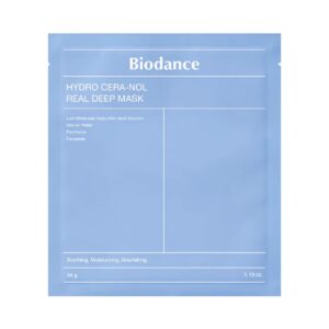En lyseblå pakke med Biodance - Hydro Cera-nol Real Deep Mask giver beroligende, fugtgivende og nærende fordele. Ingrediensoplysningerne står på forsiden. Nettovægt: 34 g (1,19 oz).