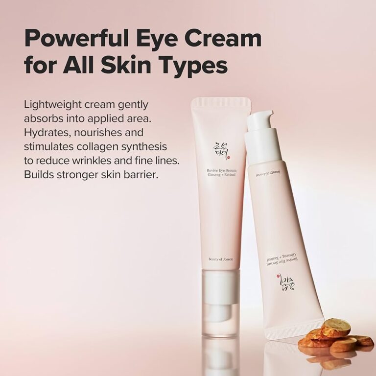 To lyserøde tuber med Beauty Of Joseon - Revive Eye Serum : Ginseng + Retinal står oprejst på en beige overflade med nødder og tørrede skiver i nærheden. Dette lette, fugtgivende serum hjælper med at reducere rynker og styrker hudbarrieren for alle hudtyper.
