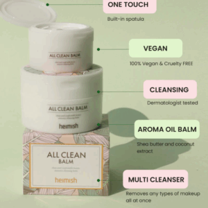 To hvide krukker Heimish - All Clean Balm 120 ml, hvoraf den ene er åben, står på en æske. Etiketterne viser indbygget spatel, vegansk og cruelty-free rensebalsam, dermatologisk testet, sheasmør, kokosekstrakt og multirens.