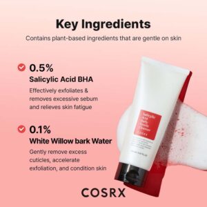 En Cosrx - Salicylic Acid Gentle Cleanser-tube hviler på pink med et strejf af hvidt skum. I teksten står der 0,5 % BHA for eksfoliering og oliekontrol og 0,1 % hvid pilebarkvand for en blid renseoplevelse.