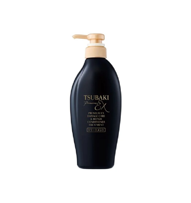 En sort pumpeflaske med Tsubaki Premium EX Damage Care Conditioner Treatment med guld og hvid tekst på forsiden mod en almindelig hvid baggrund.