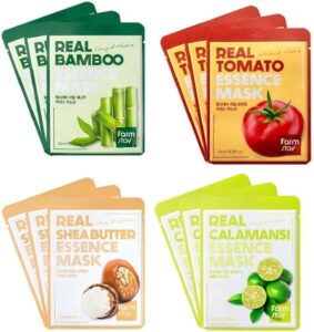 Fire Farm stay Essence Mask-pakker - Real Bamboo, Real Tomato, Real Shea Butter Essence Mask og Real Calamansi - vises, hver med billeder af deres nøgleingrediens på emballagen.