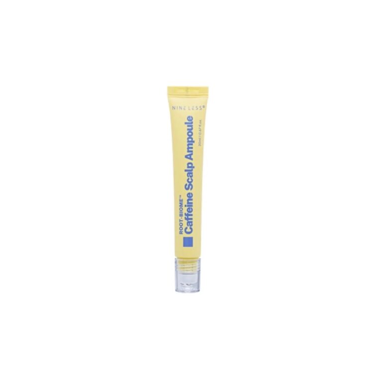 En gul tube med Nineless - Root-Biome™ Caffeine Scalp Ampoule med blå tekst og en klar hætte står oprejst mod en almindelig hvid baggrund og fremhæver dens Root-Biome™-formel.